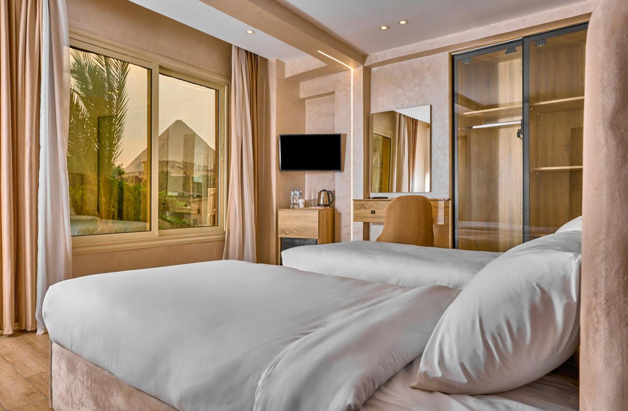 Cleopatra Tower Pyramid View Hotell Kafret el-Gabal Exteriör bild